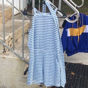 Romper with a zip up back that cones with a matching belt, has pockets, small